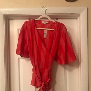 Adorable red with a white striped detail wrap top